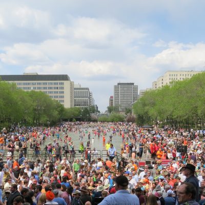 Sunshine, ice cream and a mellow multitude of 10,000 or so usher in the NDP era in Alberta