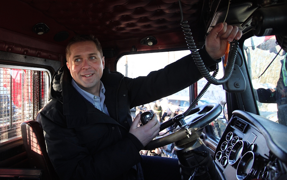 Hey, Andrew Scheer! Do you know whose truck that is you’re riding in